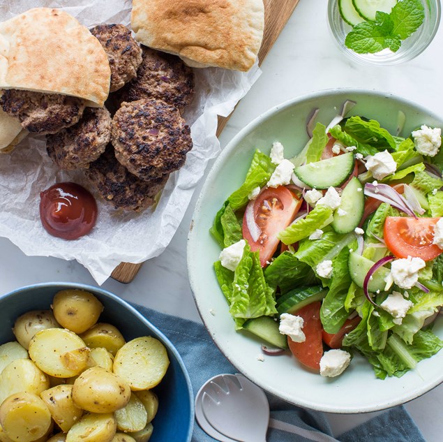 Beef Pitas with Garlic Potatoes and Greek Salad