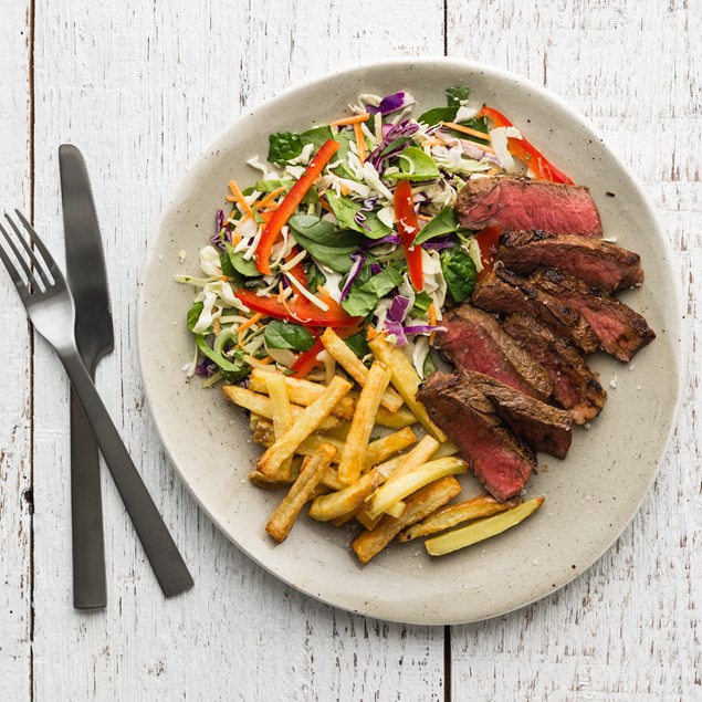 Beef Sirloin Steaks with Fries and Cheesy Slaw