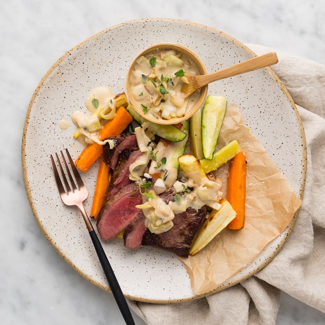 Beef Sirloin Steak with Creamy Leeks and Thyme Roasted Vegetables