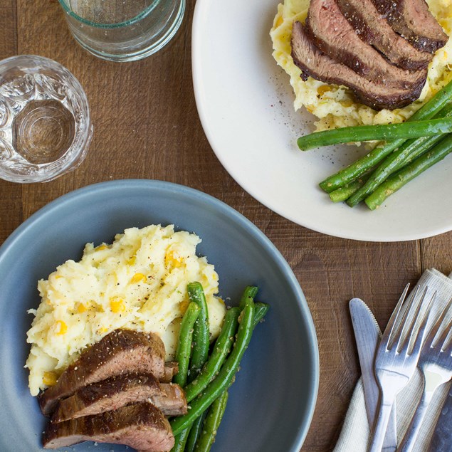 BBQ Lamb Steaks with Cheesy Potato Mash and Garlic Beans