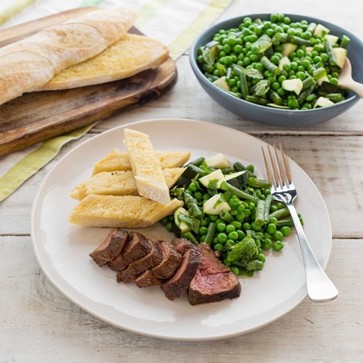 Marinated Mint And Honey Lamb Steaks With Garlic Bread And Vegetables ...